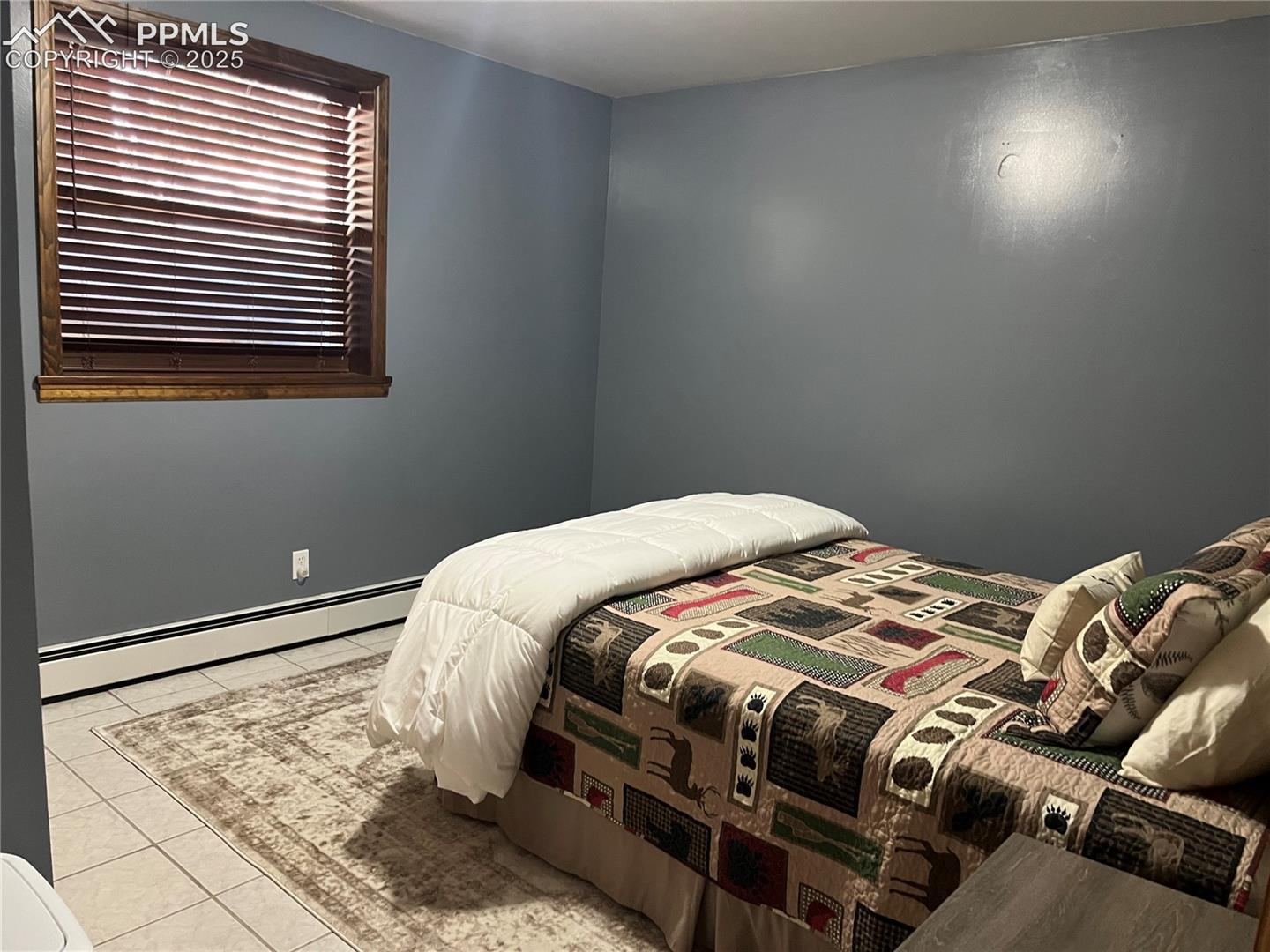 4 bedrooms total, this one is in the lower as well.   Washer and dryer and 3/4 bath round out the lower level.