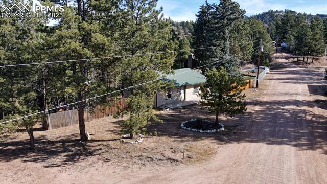 Surrounding community featuring a forest view