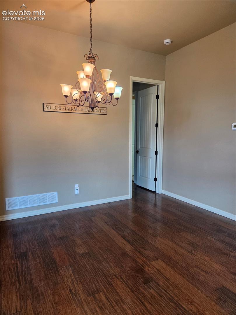 OPEN- Formal dining space ,master bedroom entry door