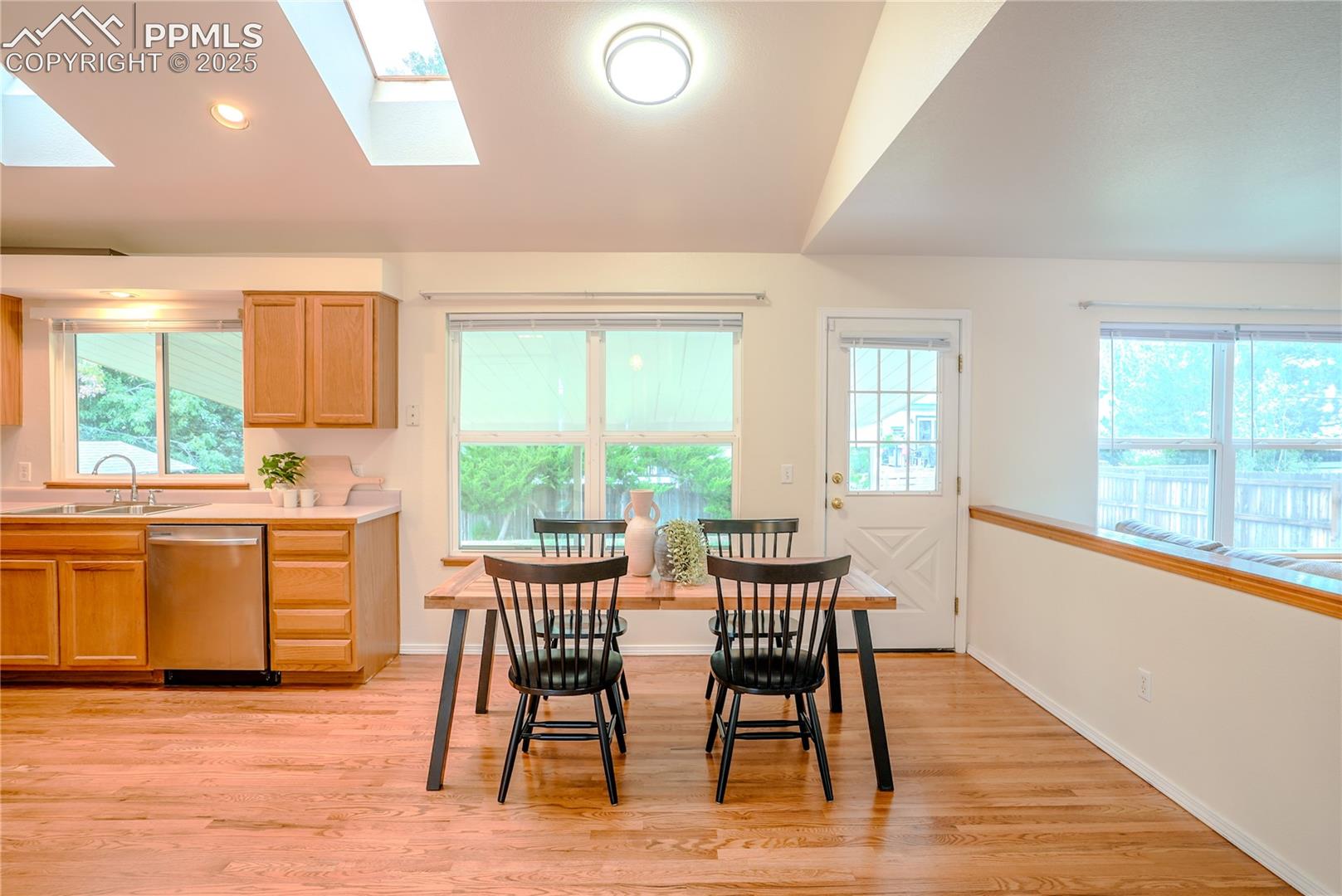 Dining space with door to backyard 