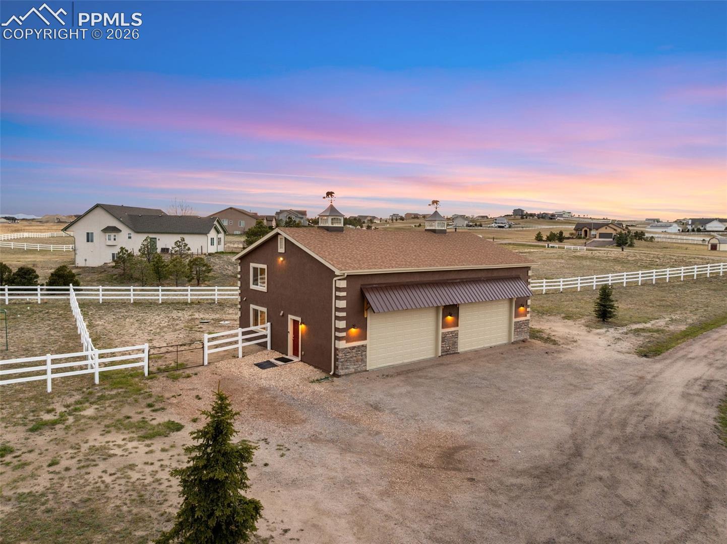 Guest house has it's own fenced in yard, and is attached to the oversized 4 car garage