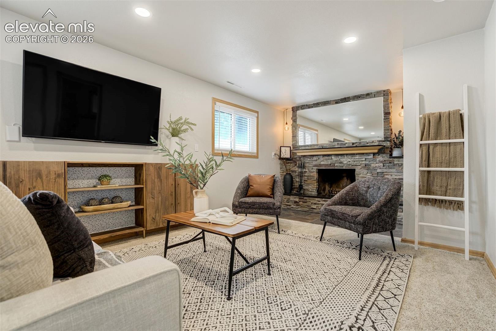 Enter: the basement. Where the wood-burning fireplace makes “cozy night in” basically unavoidable.