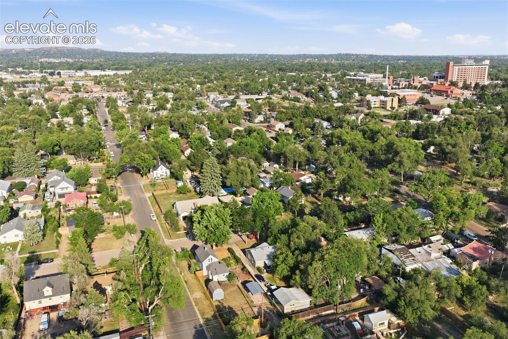 Tree-lined neighborhood with views of the nearby hospital.
