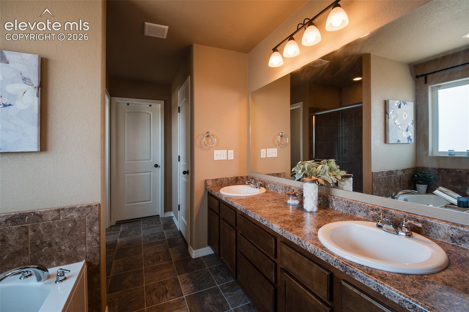 Soaking Tub in the Primary Bathroom.
