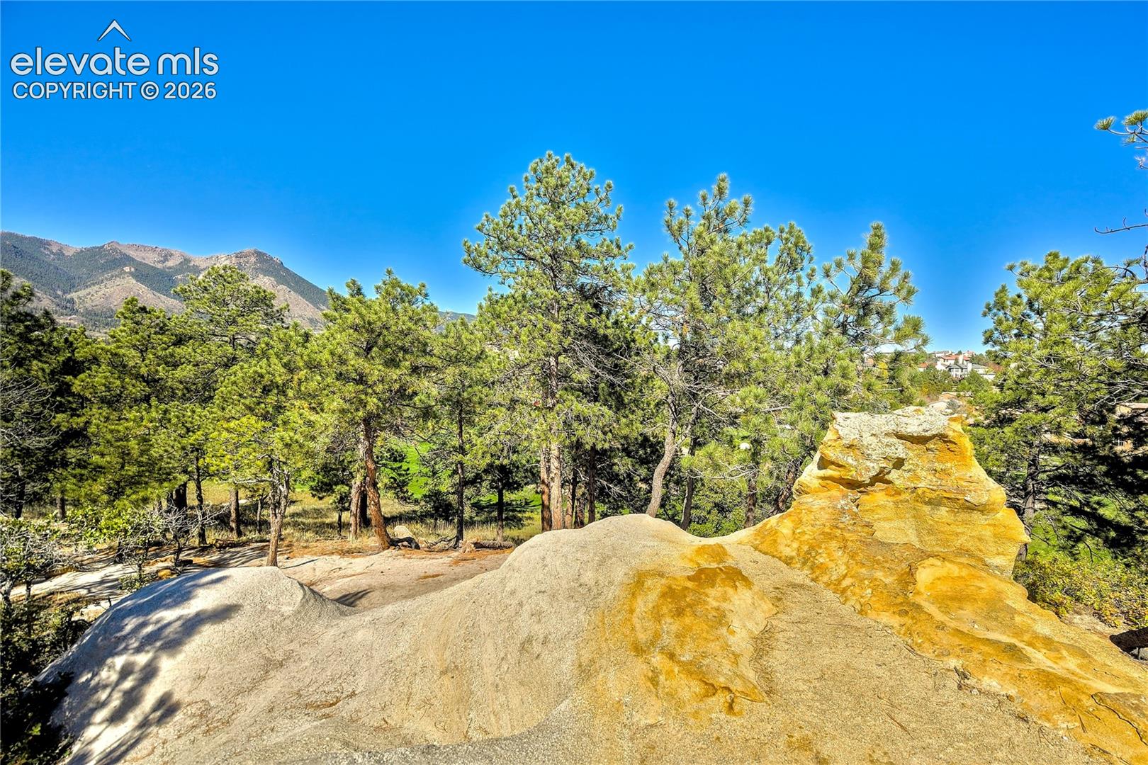 Nearby trails wind through pines + striking geological formations, offering another way to experience the Colorado landscape.