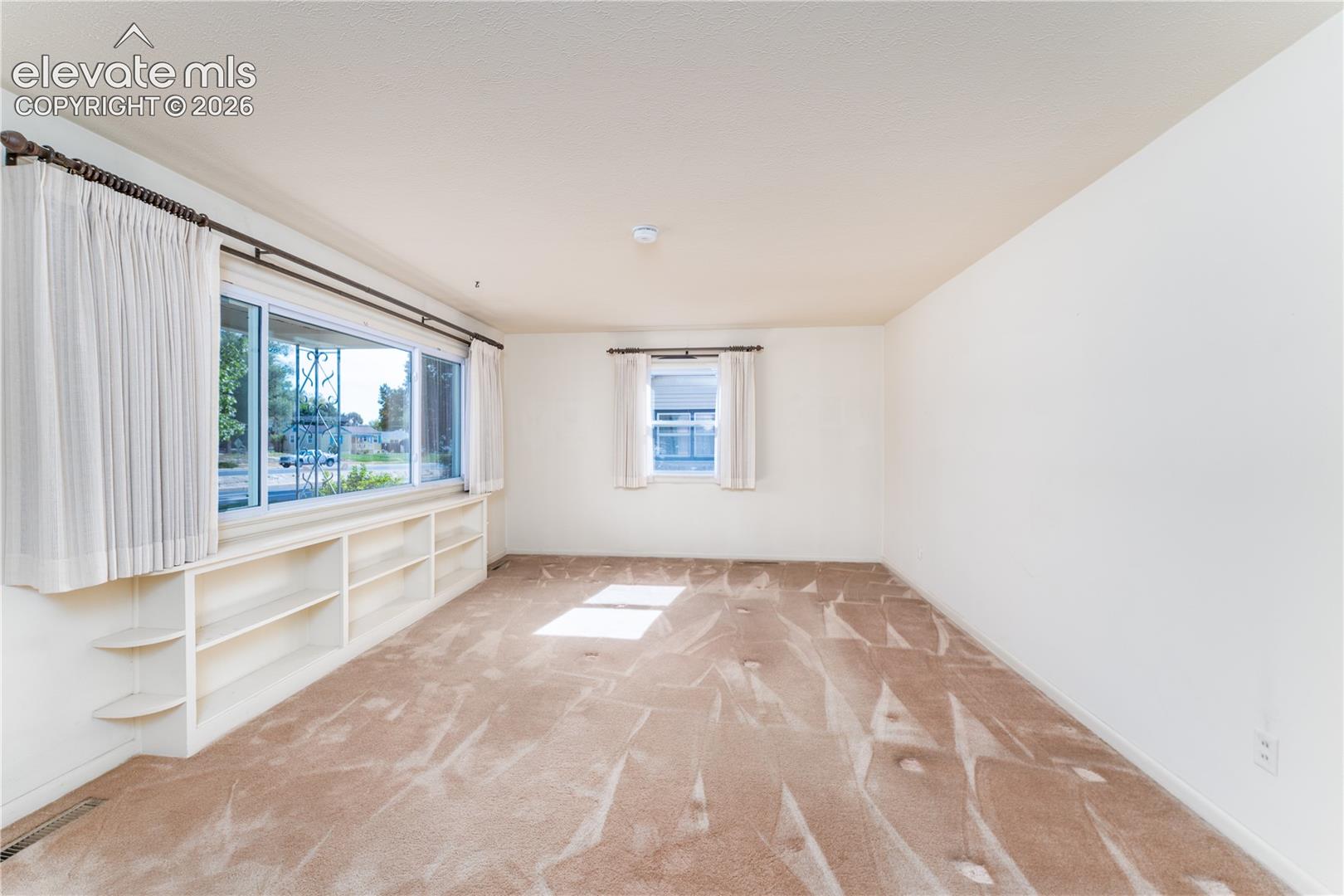 Wall-to-wall carpeting throughout
