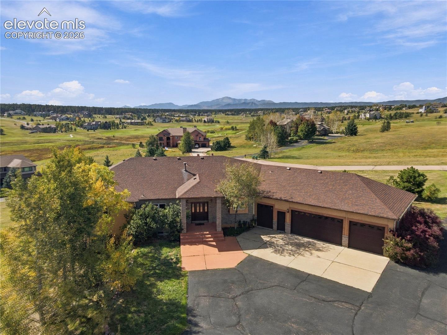 Beautiful custom rancher on 2.5 acres with extraordinary Pikes Peak views