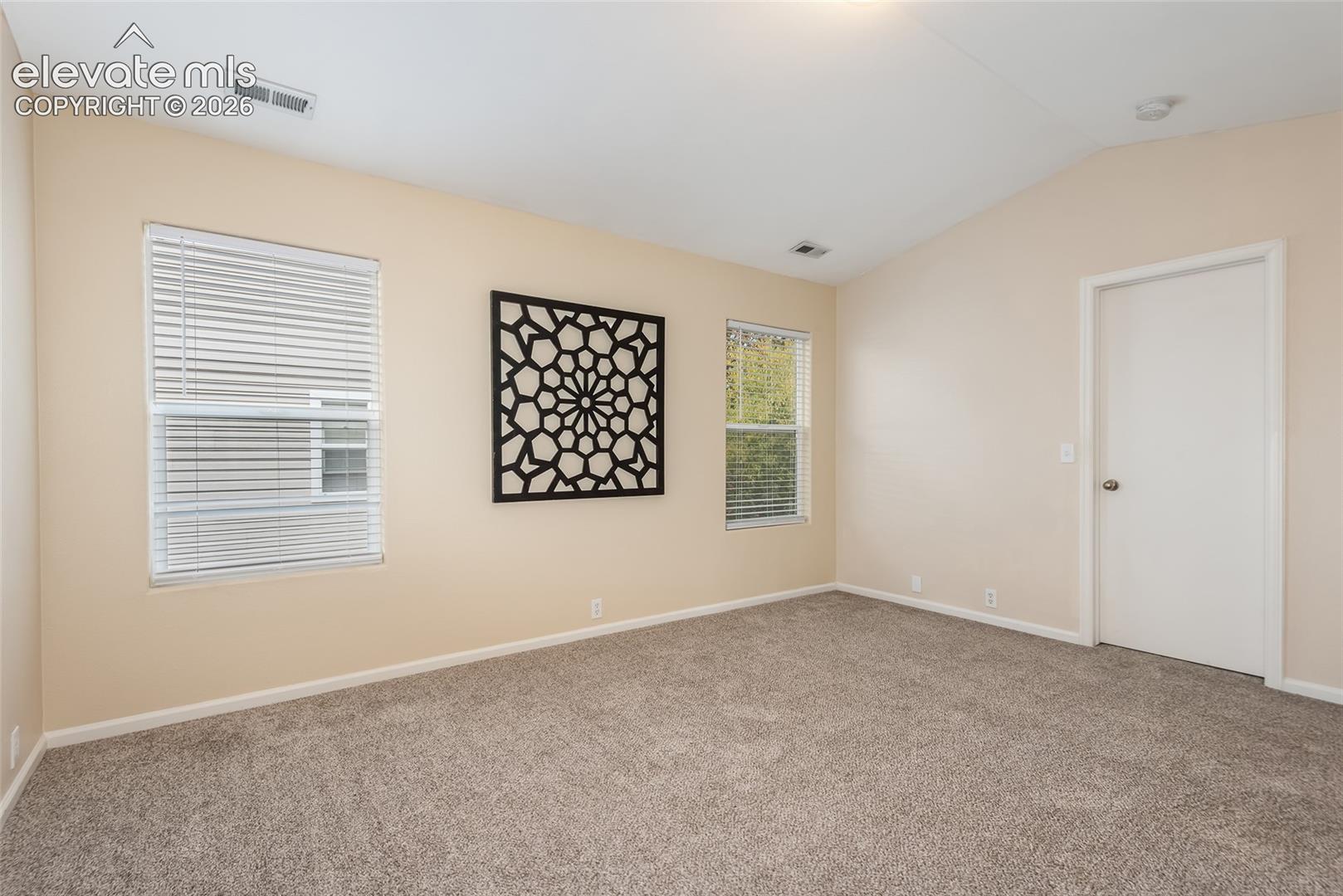 Master has vaulted ceiling and large walkin