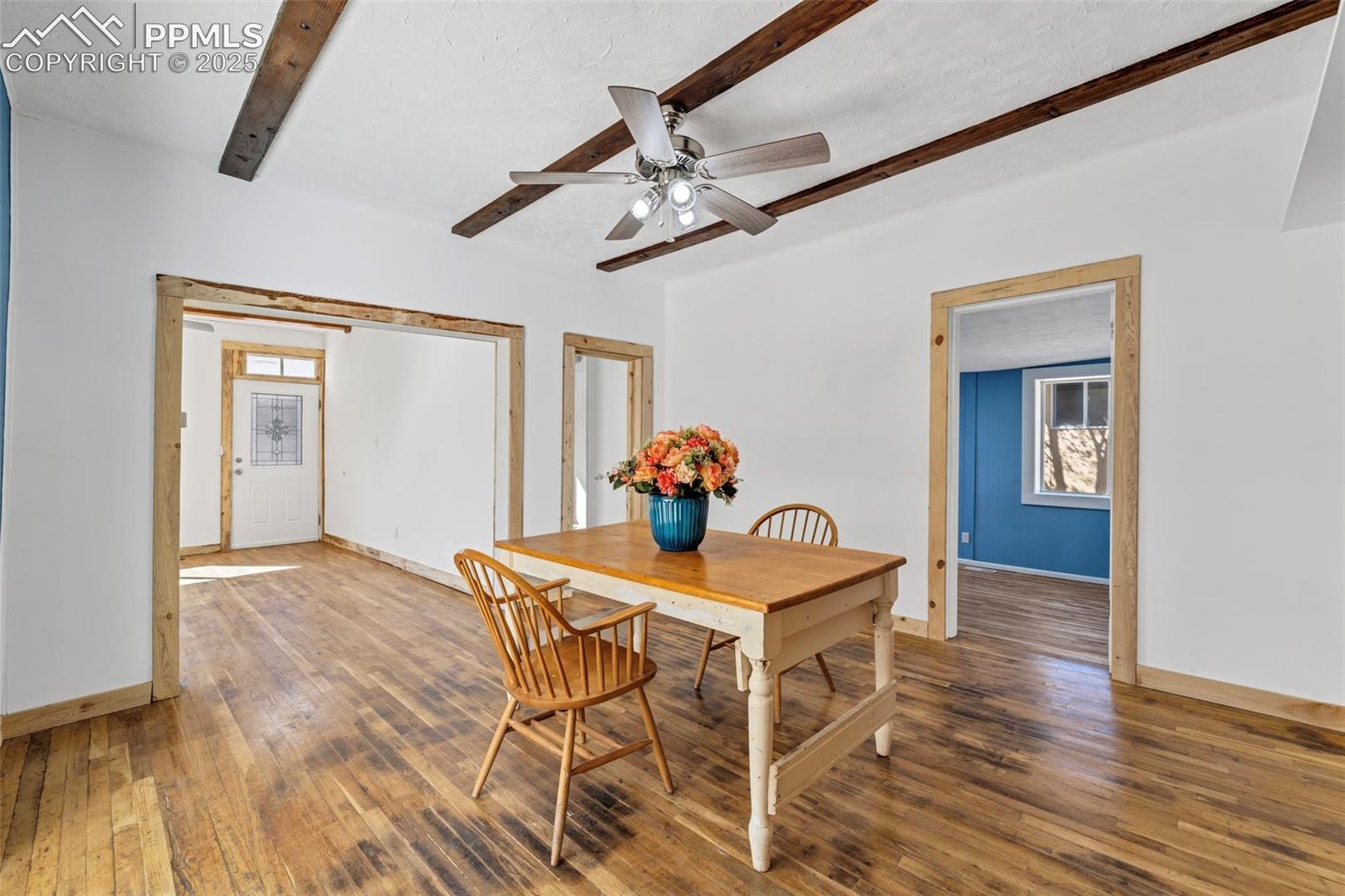 Blue bedroom off dining room