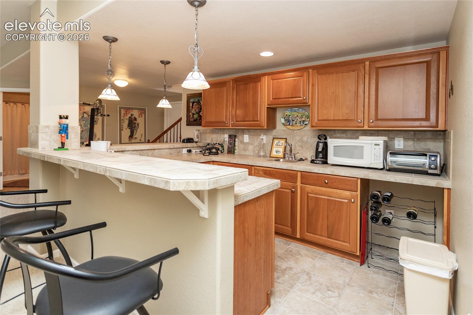 Your family & your guests will enjoy the bar dowstairs.