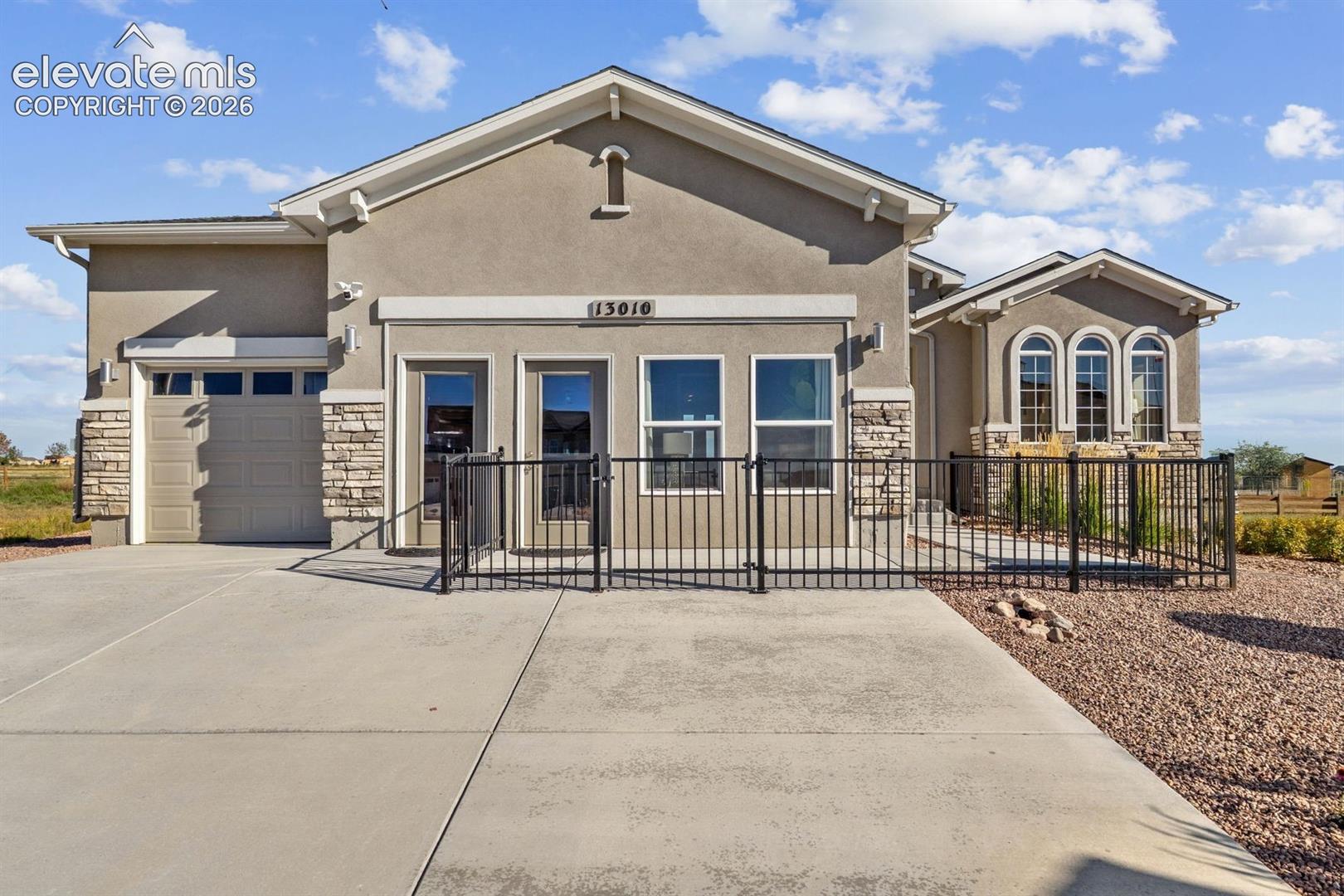 Beautiful open ranch plan has 5 bedroom, 4 bath, 3 car garage, finished basement and AC. The Chef’s kitchen features stainless steel appliances (gas range, hood, wall micro/oven combo), designer cabinets, island with pendant lights, walk in pantry and butler’s pantry, and gorgeous quartz countertops.  The stunning entry flows nicely into the formal dining and office/bedroom in the front and the kitchen is open to great room with fireplace, and dining nook with walk out covered patio.  The master suite has sitting area, walk in closet and adjacent 5 pc bath. The laundry is on the main level and connects to master.  The finished basement with 9 ft ceilings has 3 bedrooms and 2 full bath, rec room and a wet bar.  The ample windows and light in this home make it bright, open and airy! This home is designed for performance and energy efficiency and has received a HERS score. As a result, you should see savings on your utility bills. Schedule your appointment for viewing today!
