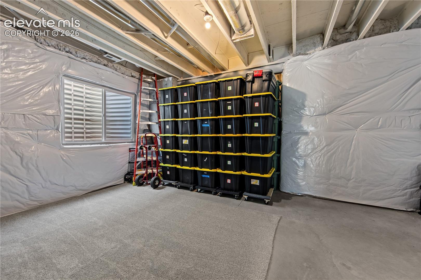 Unfinished space that could easily be converted into another bedroom. 