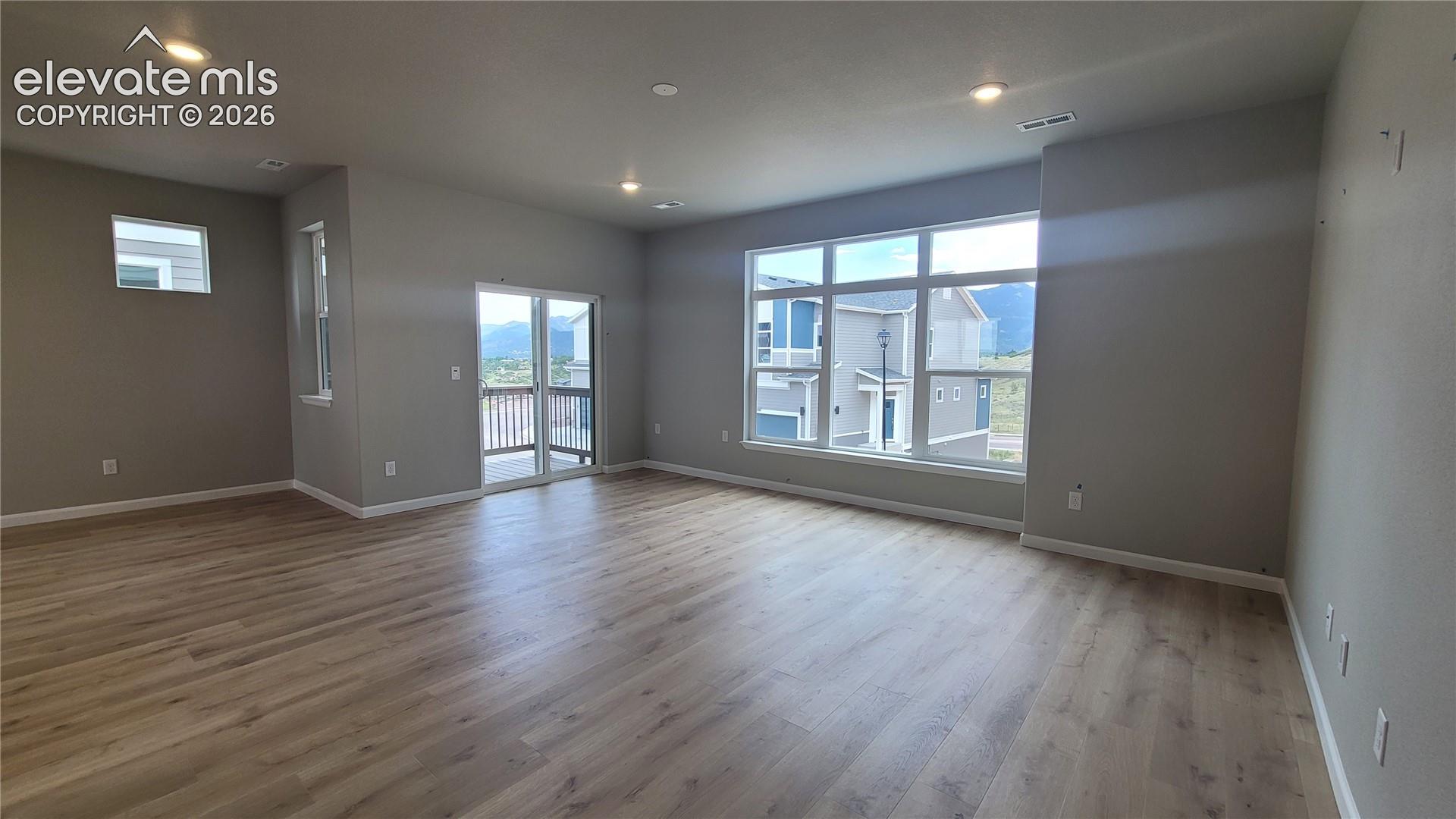 Another View of Living Room with walk out to Composite Deck! 