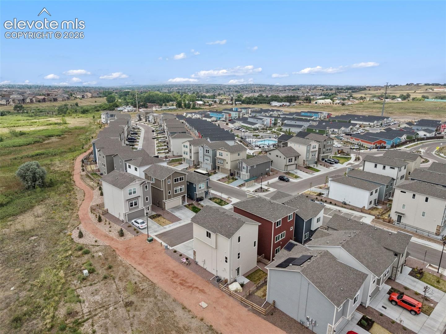 View of neighborhood showing pool and layout