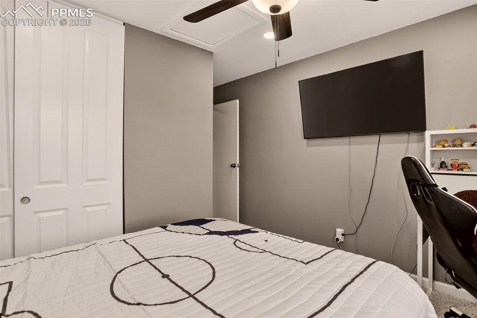Second bedroom features new paint, new carpet and ceiling fan for added comfort. 