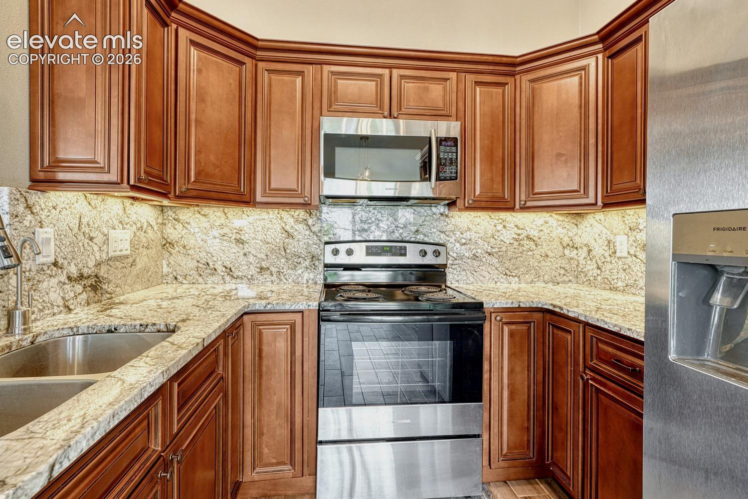 Note the under-cabinet lighting and crown lighting