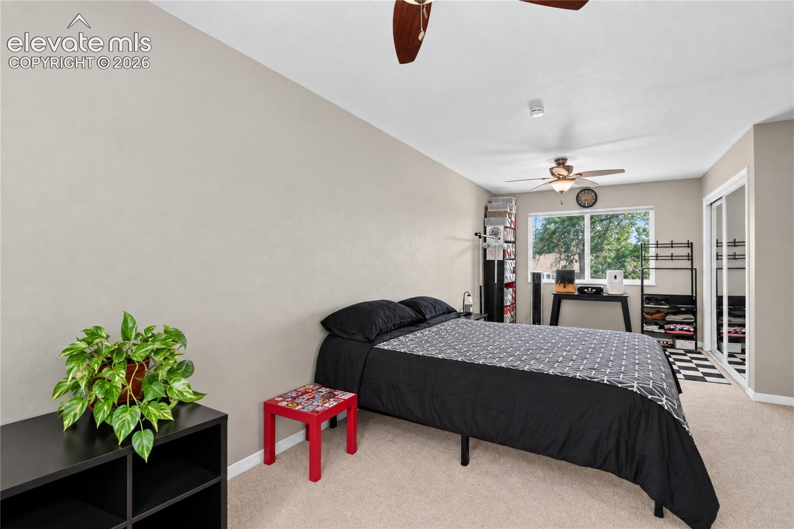  - primary bedroom with walk-out to deck