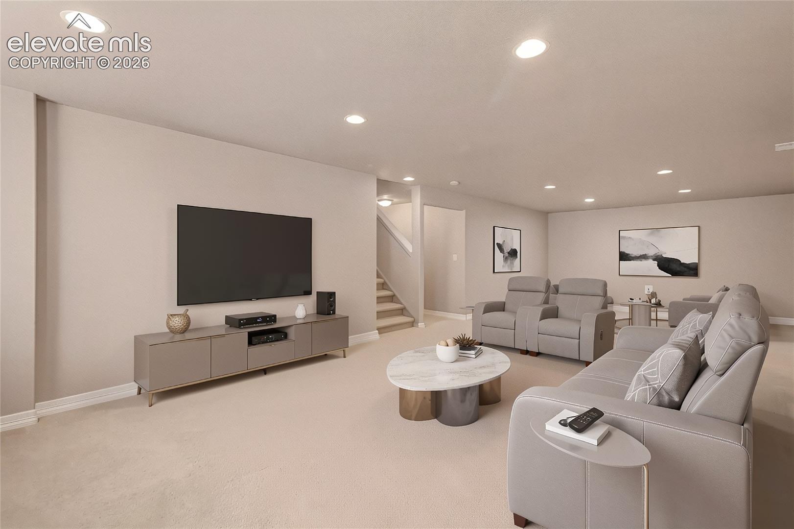 Recessed lighting illuminates this spacious living area with neutral-toned walls and plush carpeting