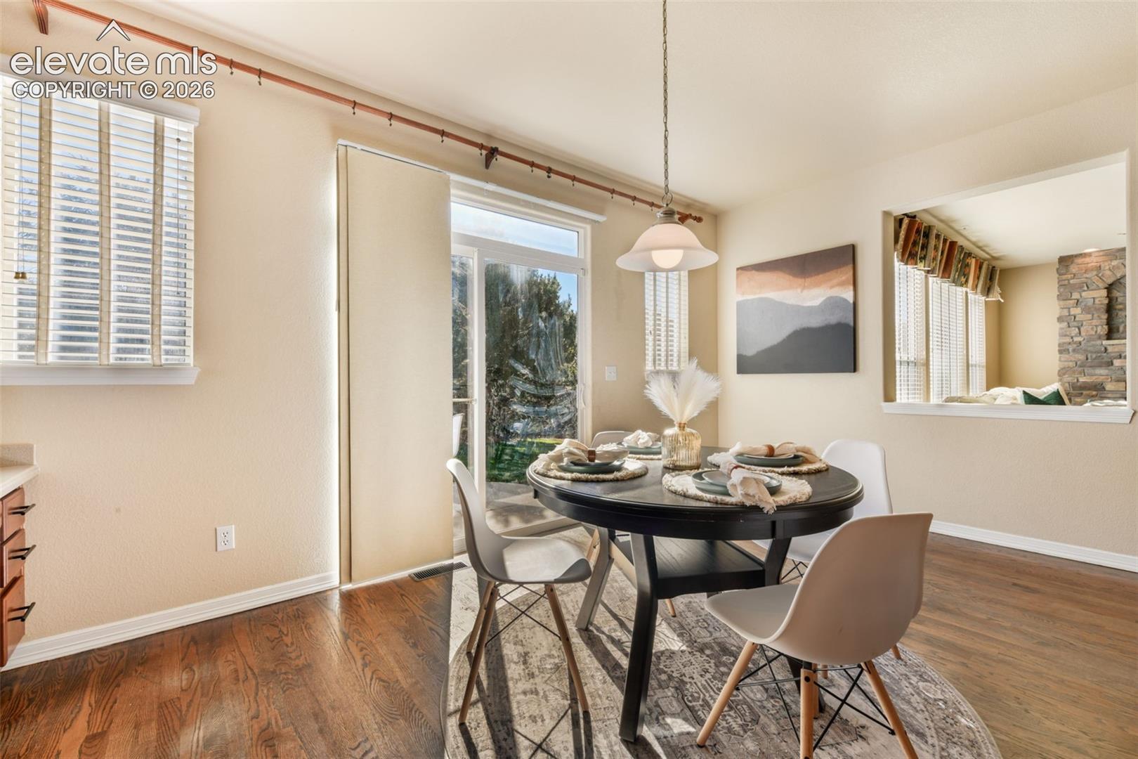 Hardwood-style flooring throughout