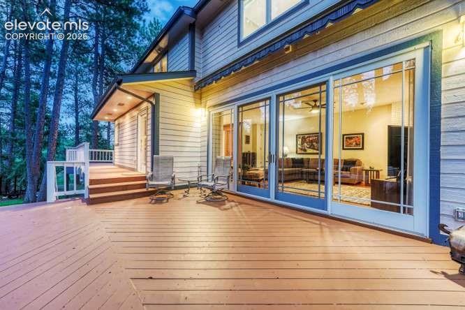 deck with Bi-Parting sliding glass door to allow you to bring the outside in.