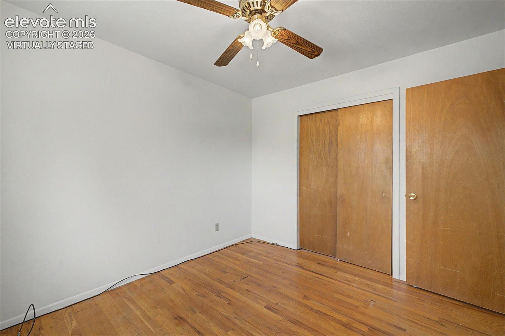 Virtually Staged with flooring - wood flooring under carpet