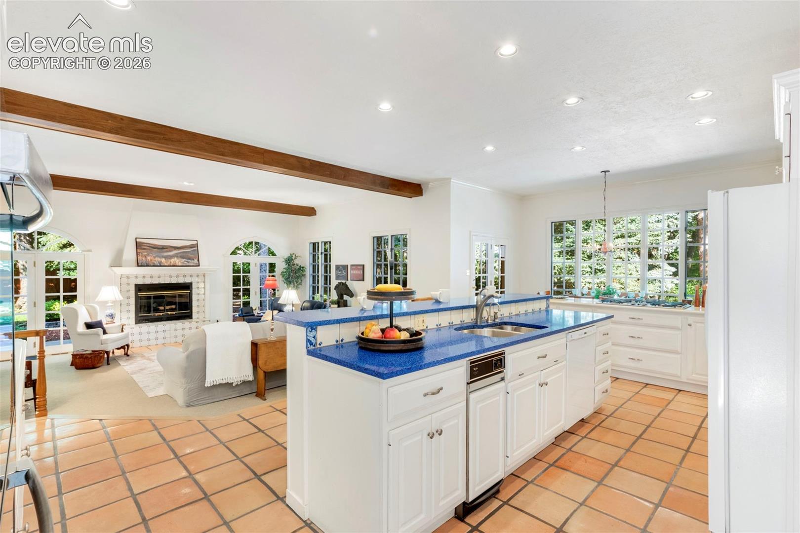 Kitchen open to stepdown family room