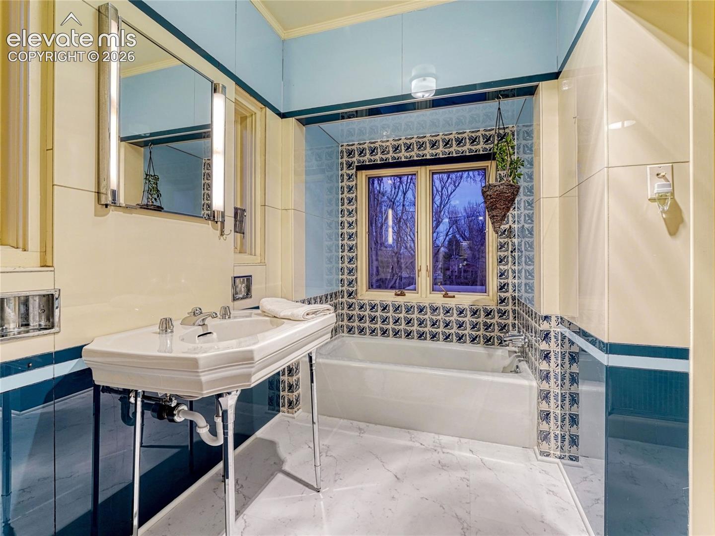 Primary ensuite with original 1939 sink and finishes.
