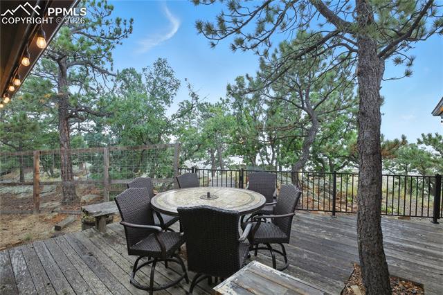 Wooden deck with outdoor dining area