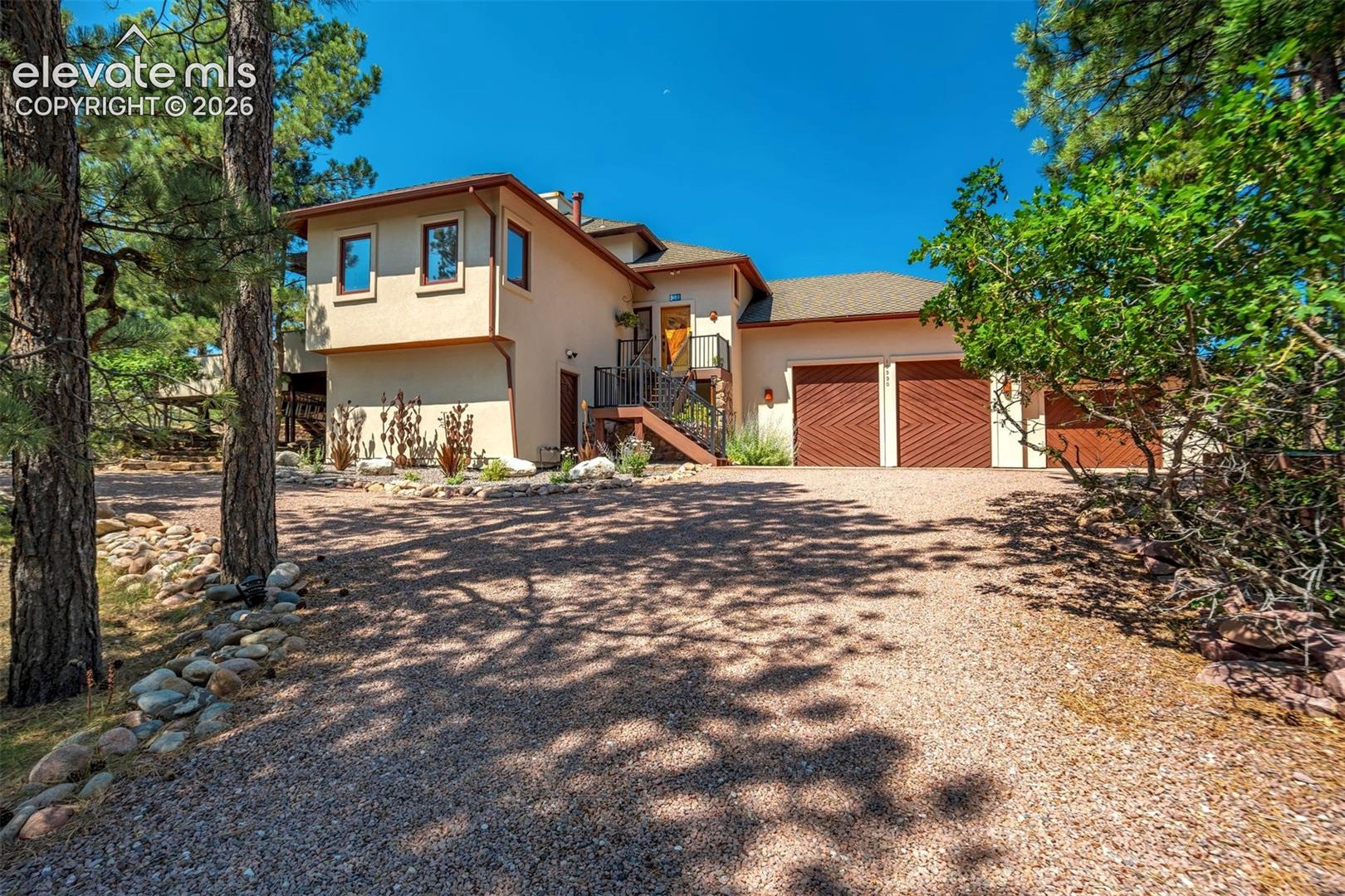Once last view from the front circular driveway that offers options for RV parking in the drive or garage.