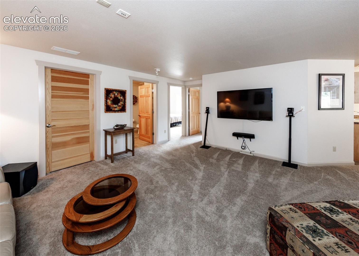 Large lower level family/theater room with plenty of space for everyone!