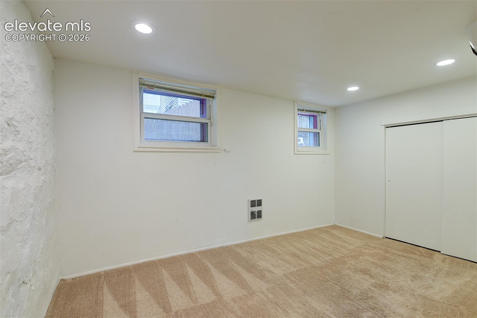 Basement unit located in the back of the property 