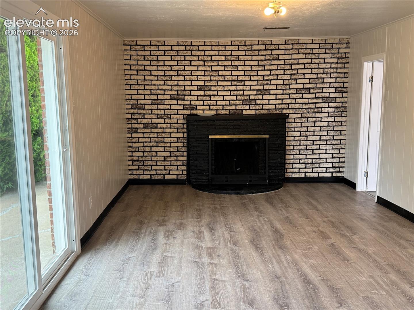 Bonus Room in Garage w/Wood Burning Fireplace