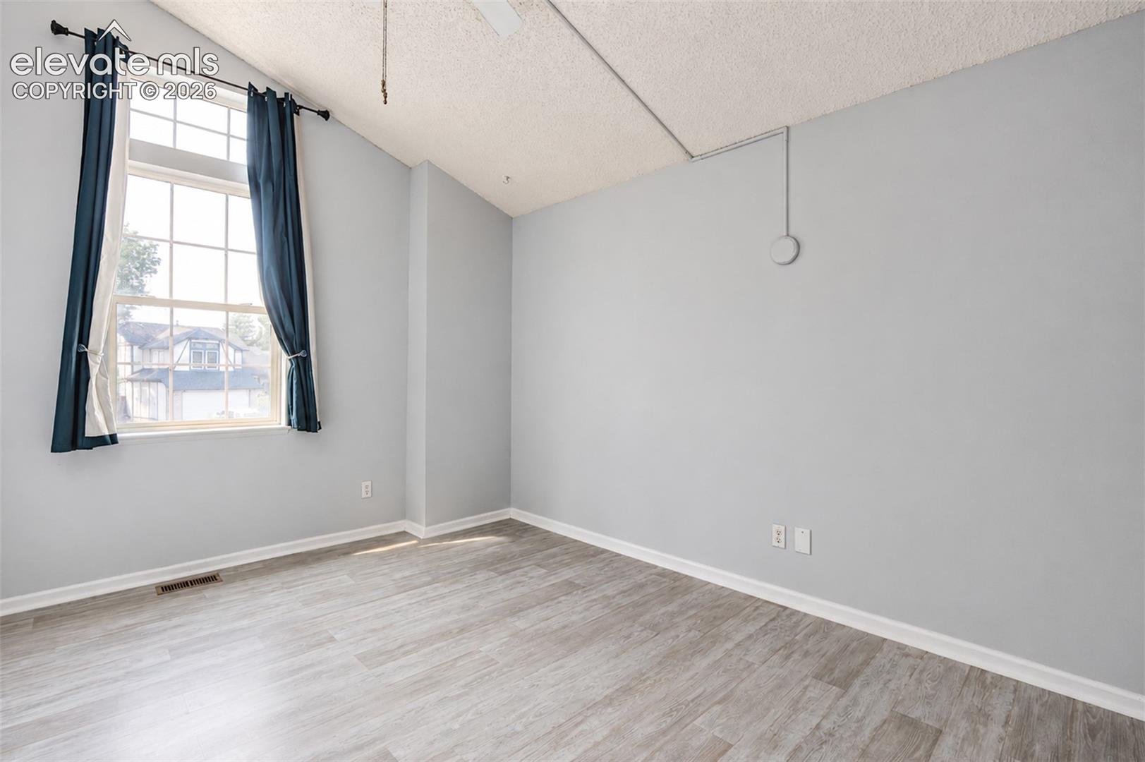 2nd Upstairs Bedroom with View to Front Yard.