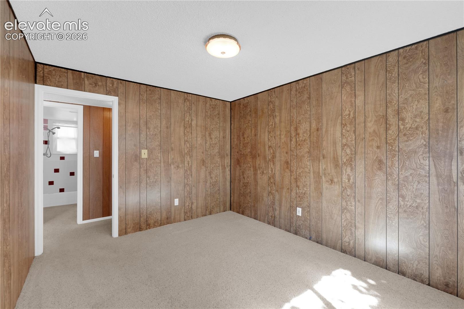 Lower level bedroom 1 across from full bath