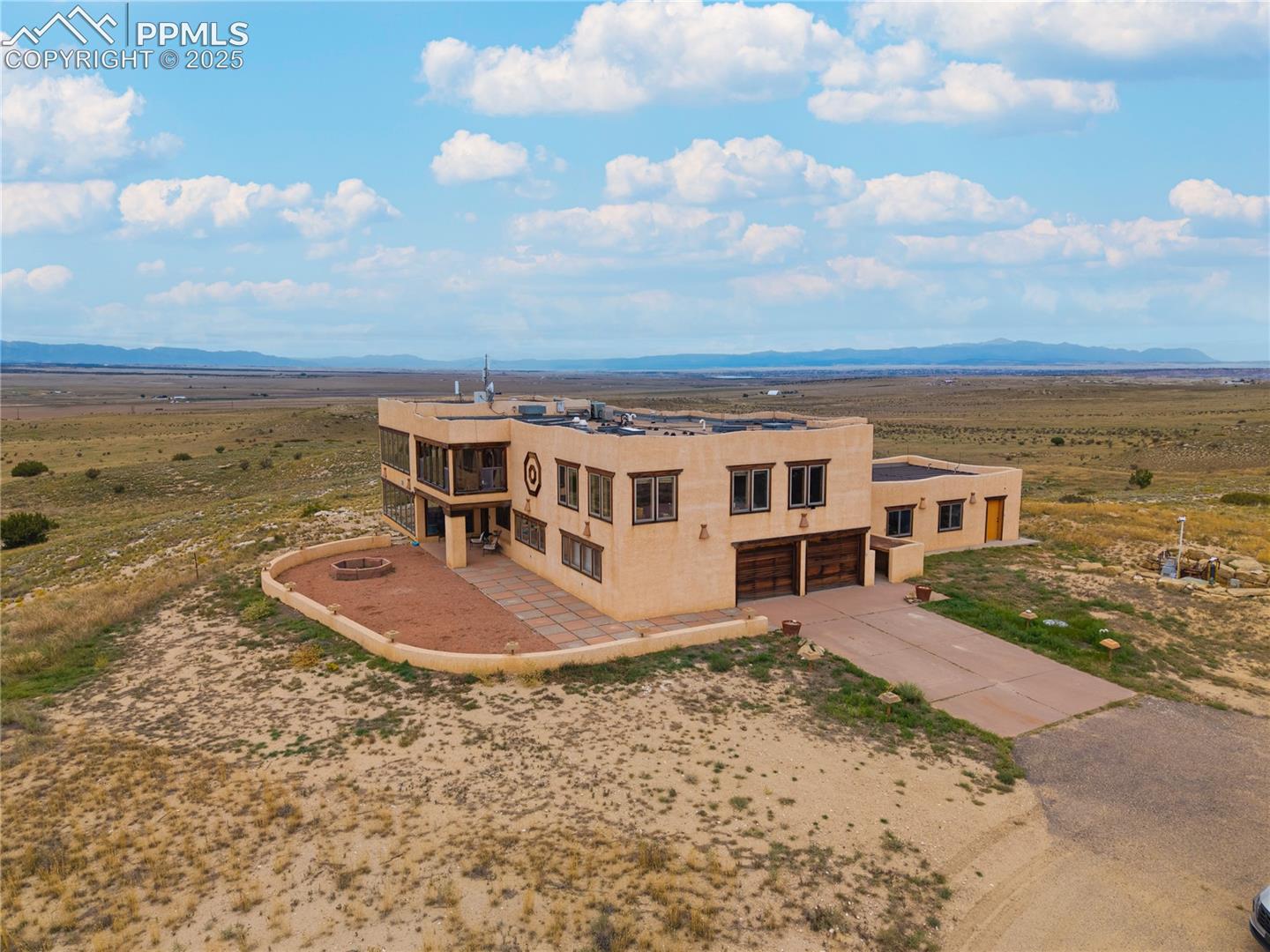 View from above of property with mountains
