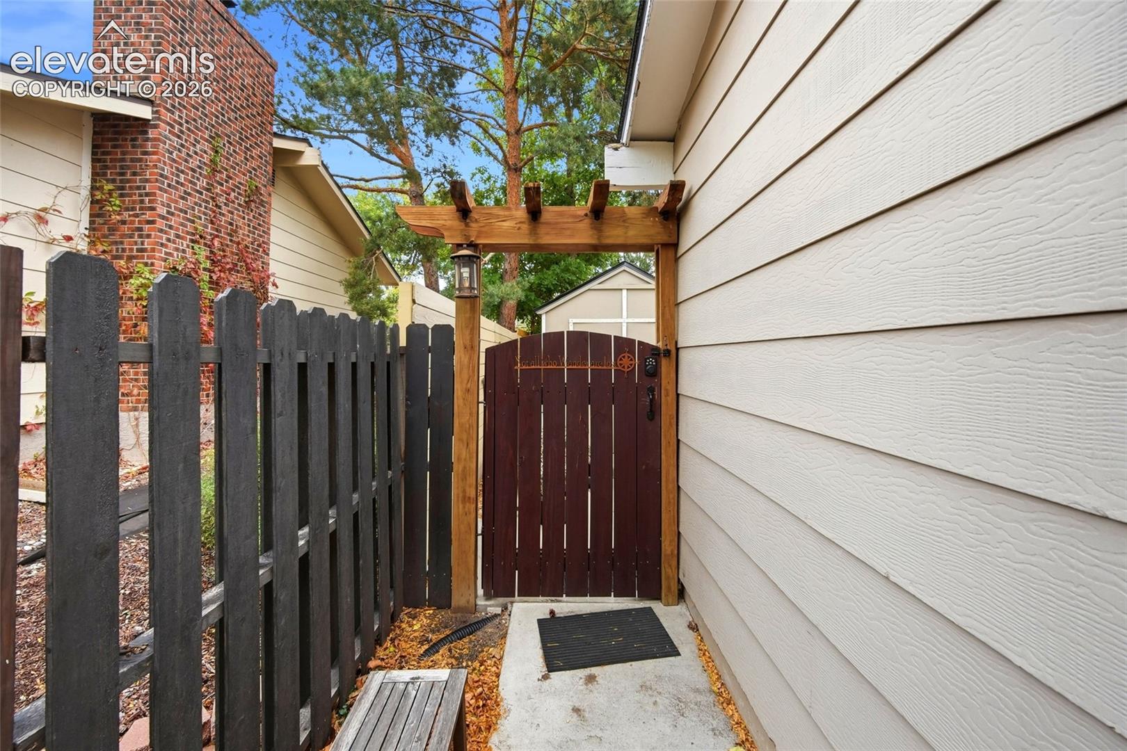 Guest Apartment gate on north side of home