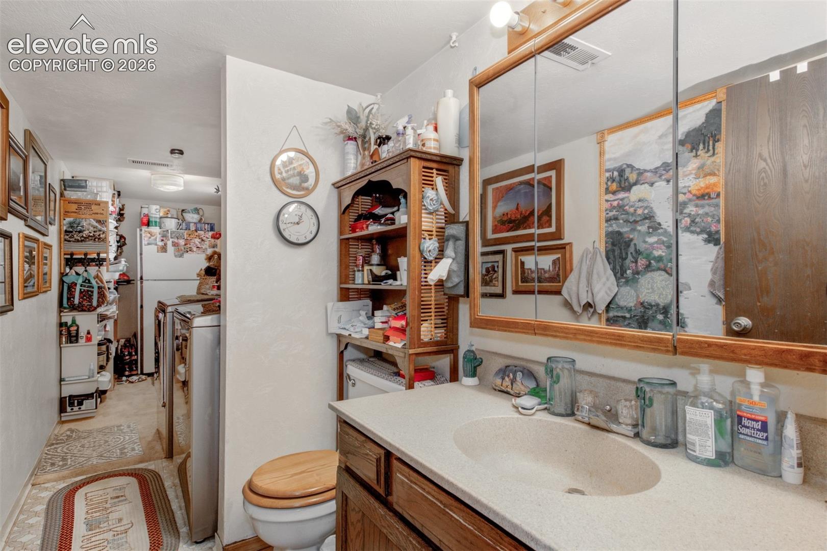Half Bath, Laundry area. and more storage off of Family Room.