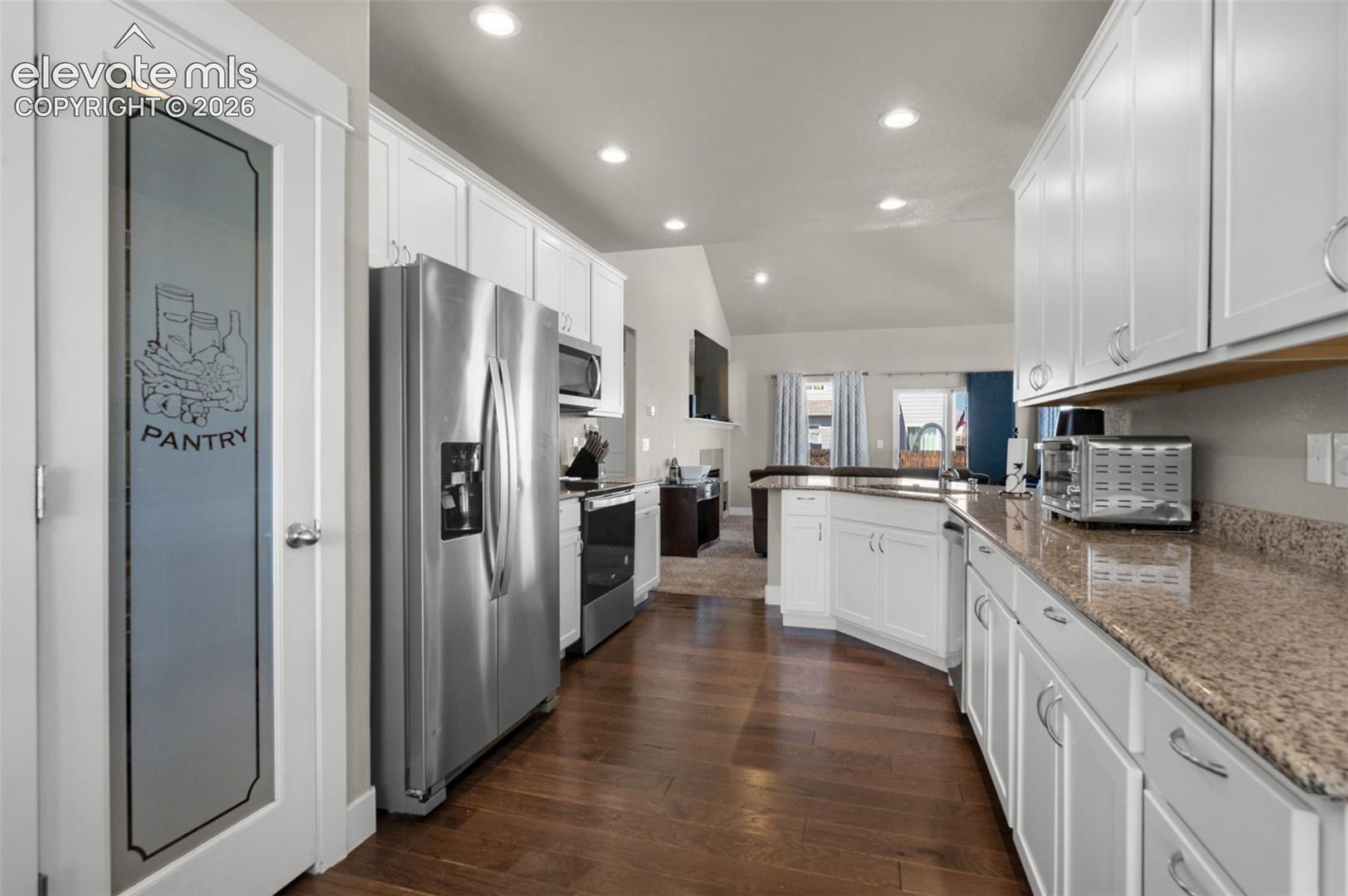 Notice the sigh decor in the pantry door.