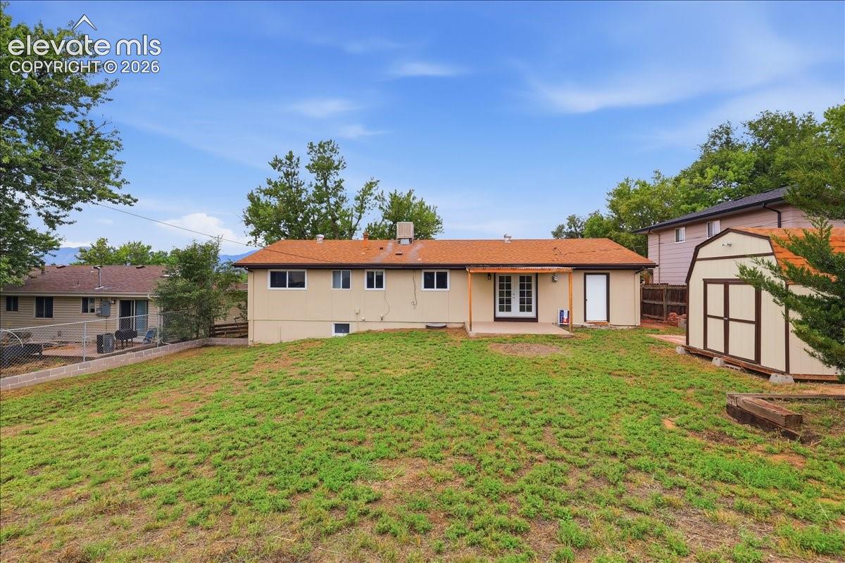 Large fenced backyard.