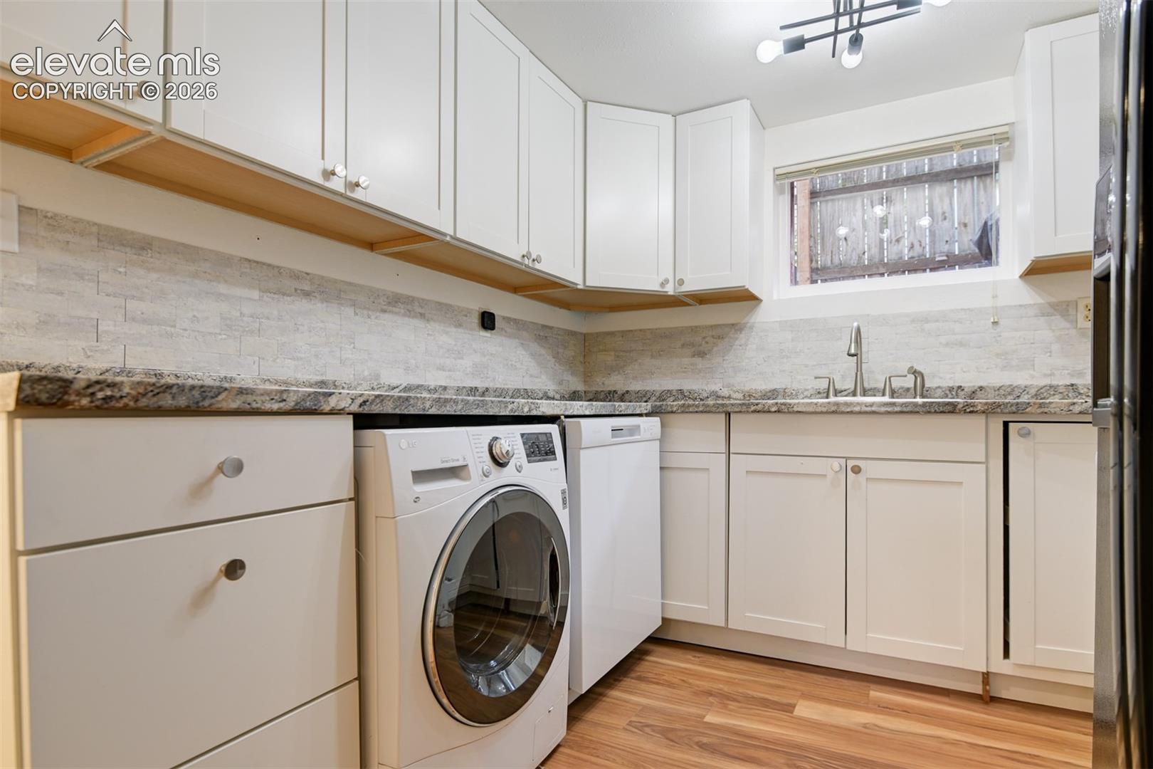 Basement unit located in the back of the property 