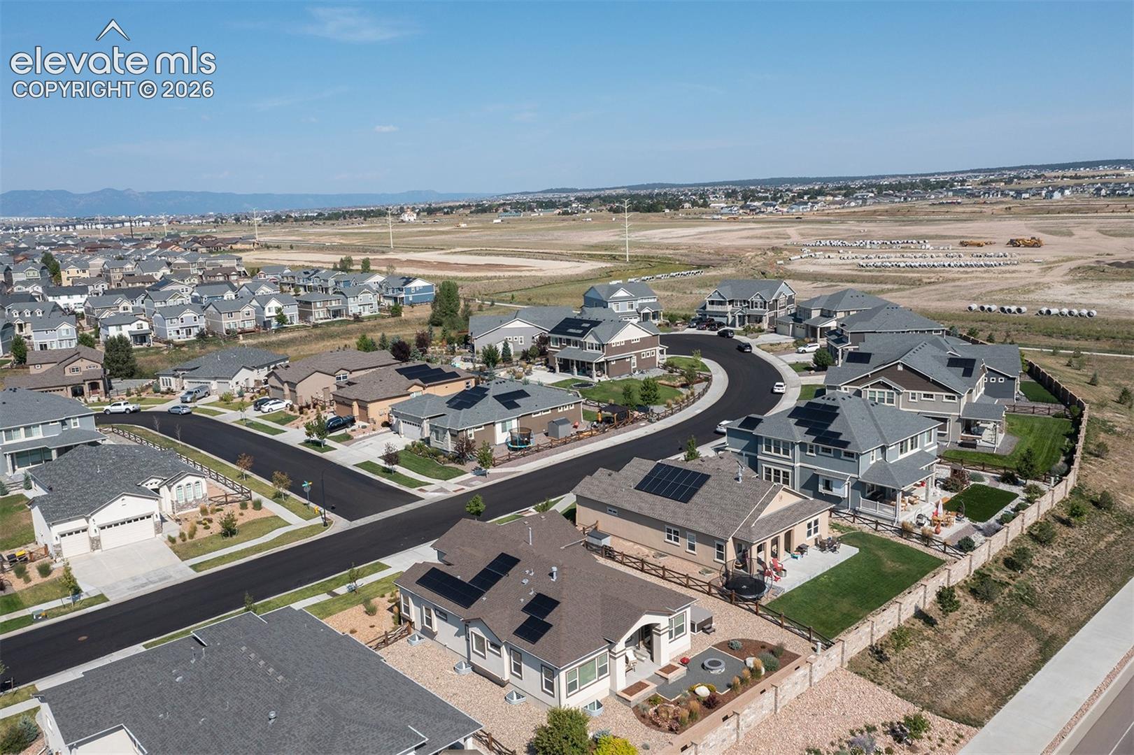 Residential community featuring varied architectural styles and integrated solar panels