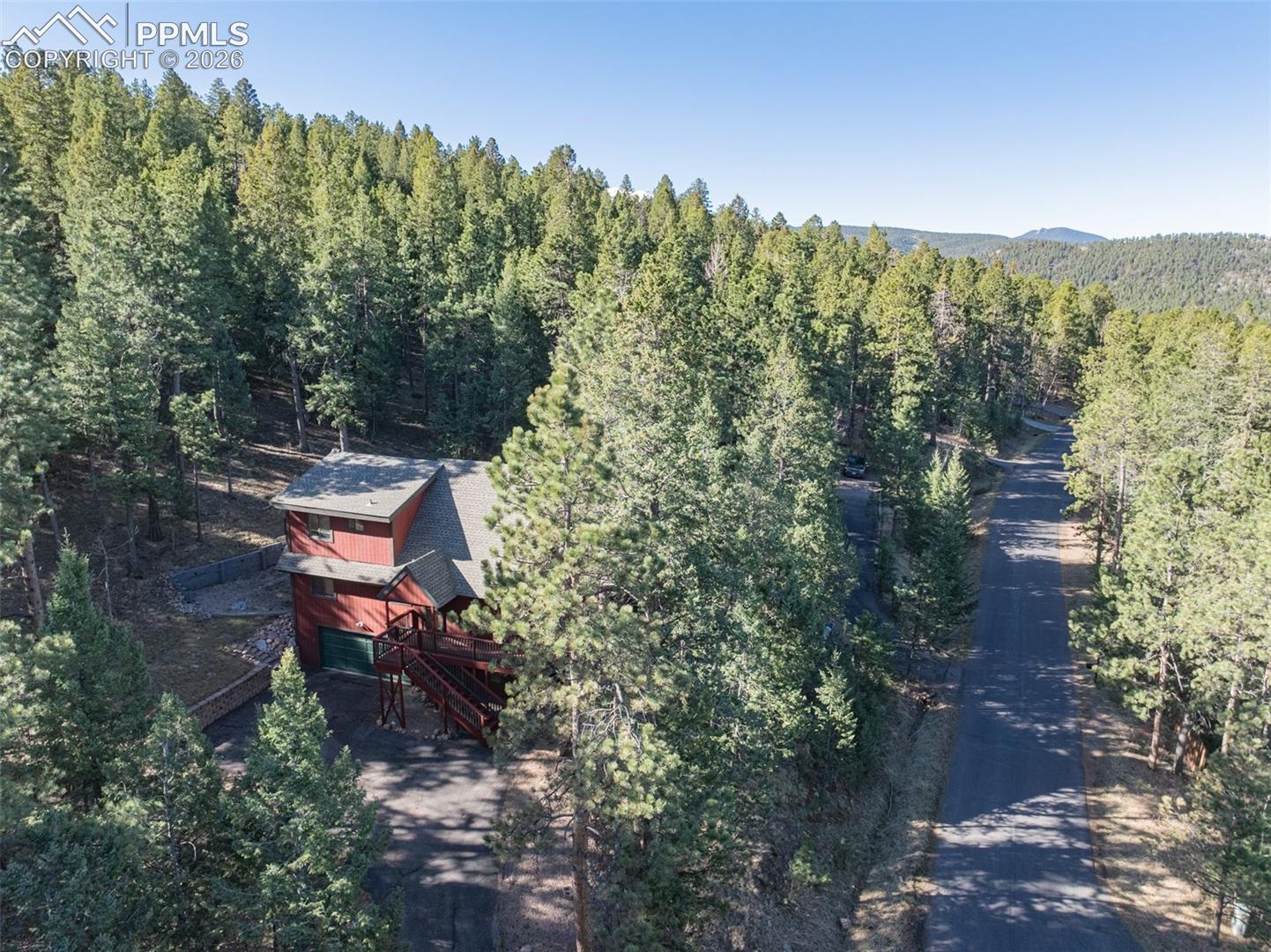 Aerial view of a heavily wooded area