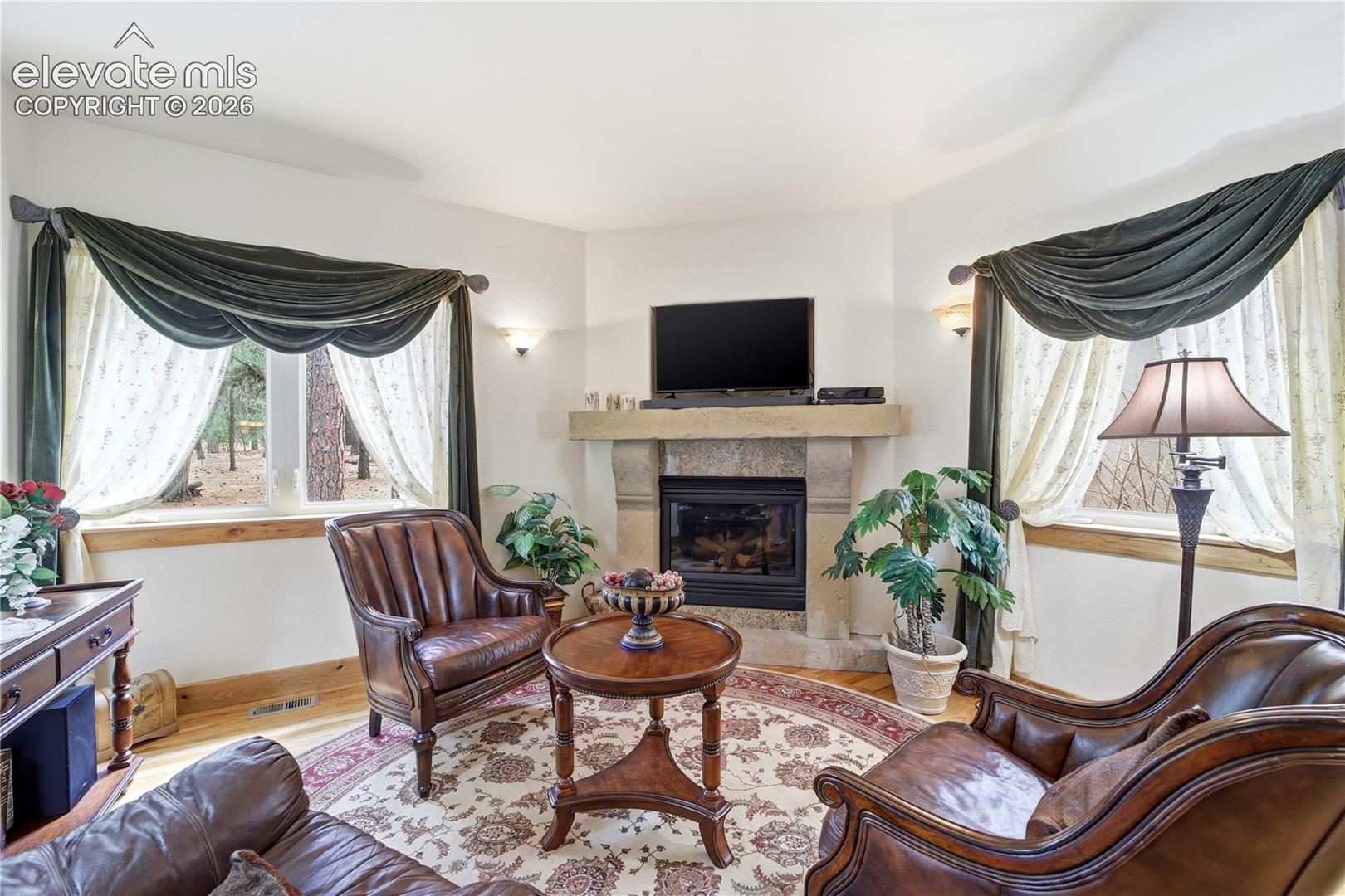 Speak Easy intimate seating area with open passthrough to kitchen