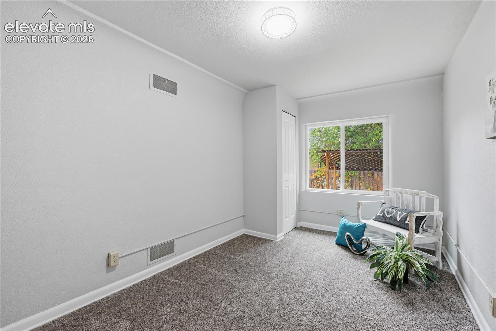 Another view of a secondary bedroom.