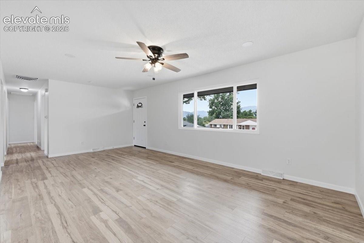 Large living room. Brand new windows.