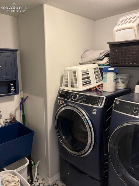 Main level laundry room with sink