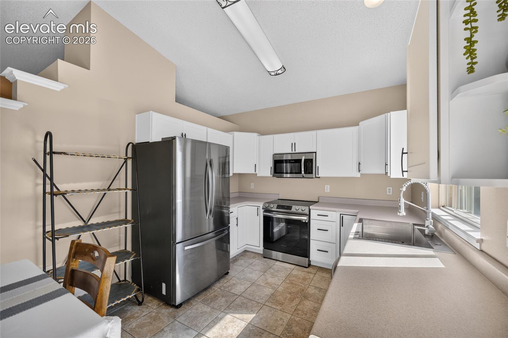 Kitchen with ceramic tile floors