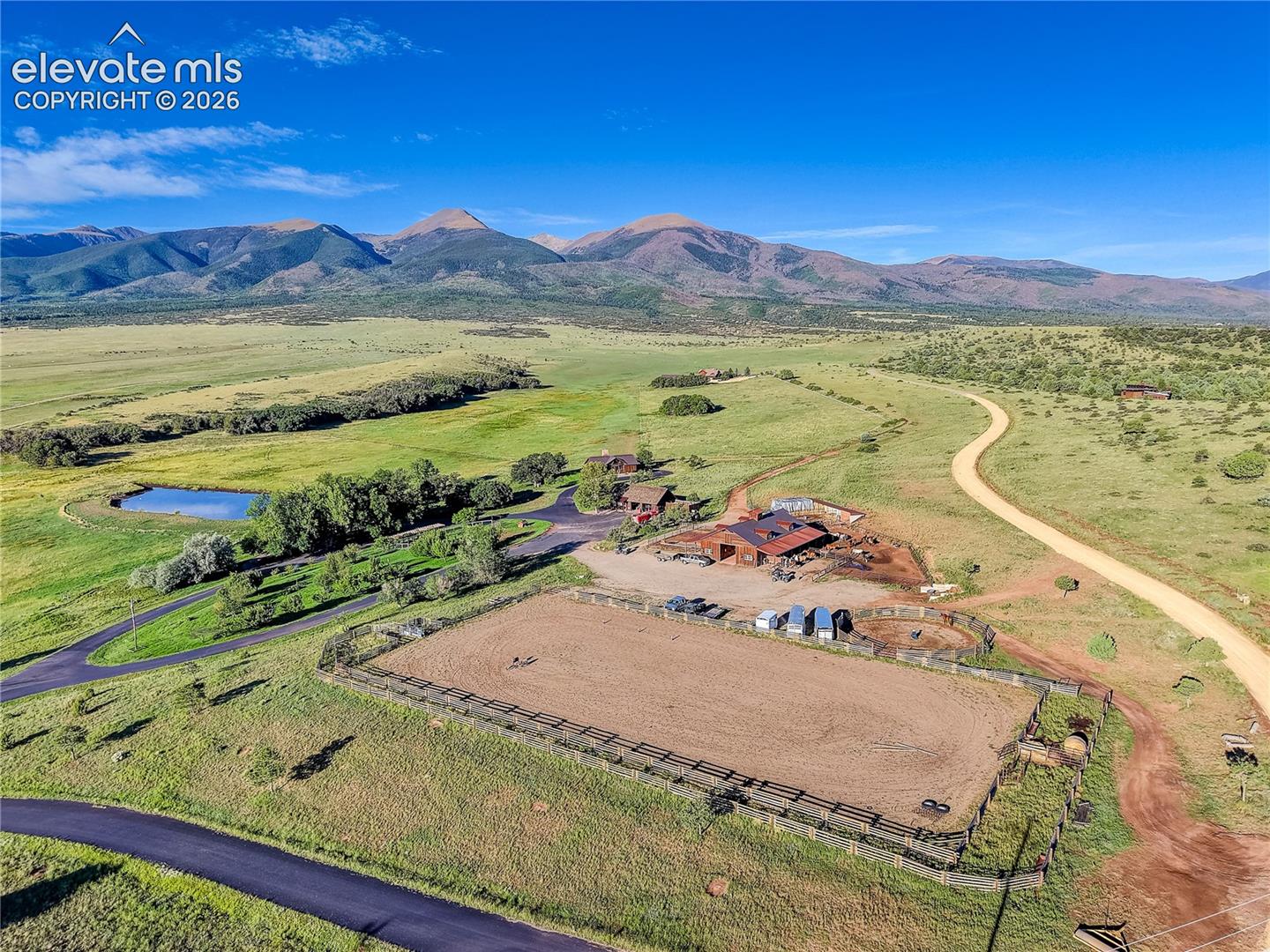 Community stables, corral, chicken coop, & garden