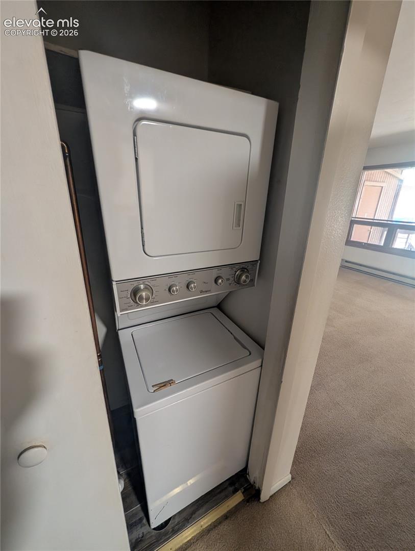 White stackable washer and dryer unit