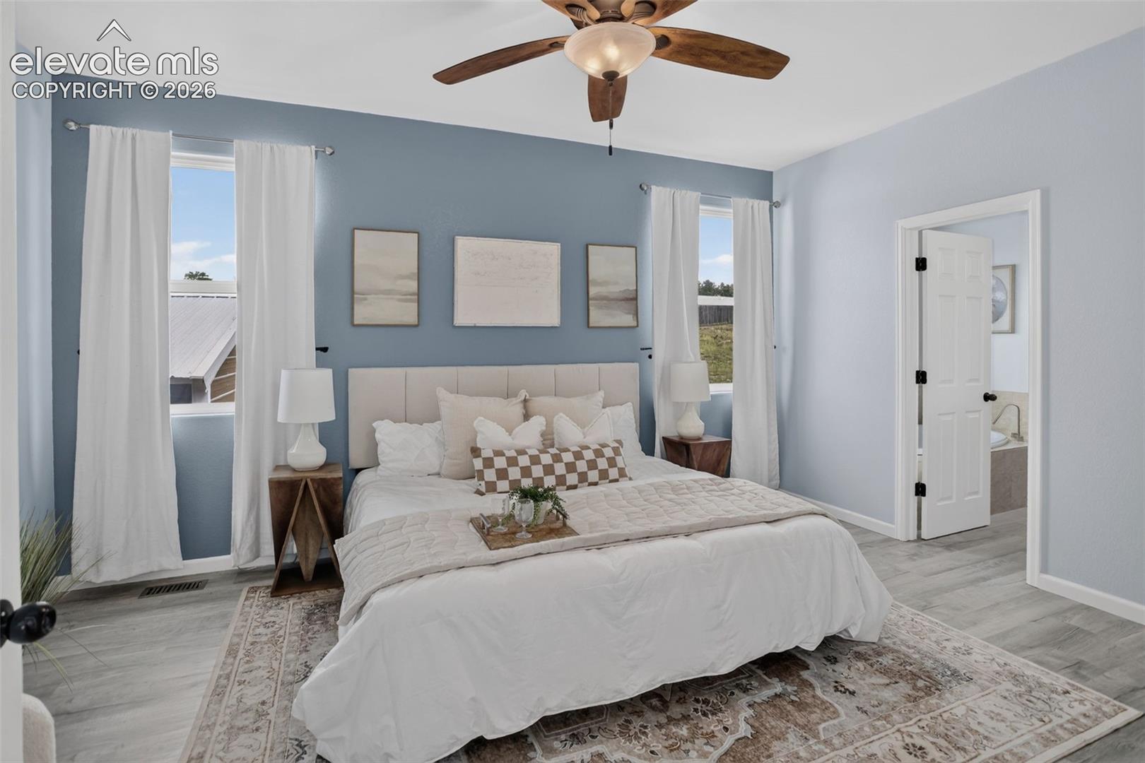 Large primary bedroom with ensuite bathroom.